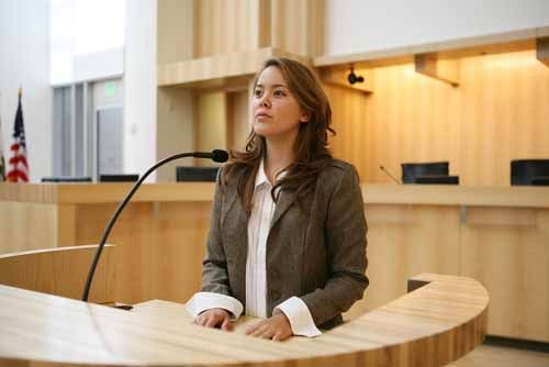A woman testifies in court